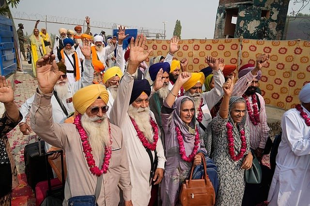 Indian Sikh pilgrims cross into Pakistan for Guru Nanak's birth anniversary celebrations